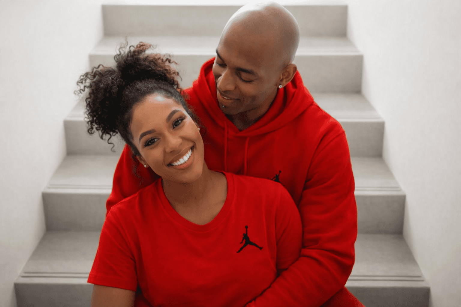 Peter and Sola sitting together at home as they begin a new chapter of their life in Britain
